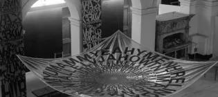 Installation of visual text works by Ferdinand Kriwet in ECA's Sculpture Court for Strategy: Get Arts (1970). Photo