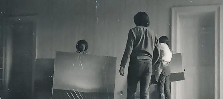 Paintings by Gerhard Richter being moved by student assistants in preparation for Strategy: Get Arts. Photo