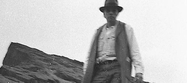Joseph Beuys on Salisbury Crags, Holyrood Park, Edinburgh, on 7 May 1970. Photo