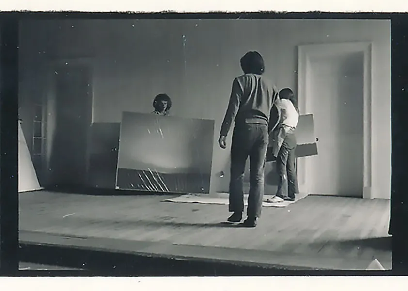 Paintings by Gerhard Richter being moved by student assistants in preparation for Strategy: Get Arts. Photo