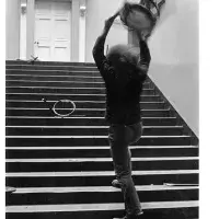 Stefan Wewerka’s ‘Bentwood Chair Action’ on the grand staircase with Klaus Rinke smashing chair (August 1970). Photo