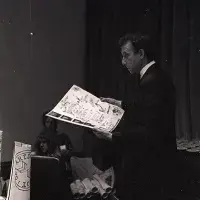 Daniel Spoerri reading from his menu for The Banana Trap Dinner in C.26, the old Boardroom of ECA (23 August 1970). Photo