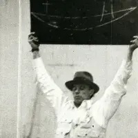 Joseph Beuys holding up a blackboard during his performance event Celtic (Kinloch Rannoch) Scottish Symphony, in studio C.08