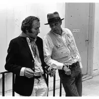 Richard Demarco and Joseph Beuys by the staircase of the Sculpture Department corridor, SGA at ECA (1970). Photo