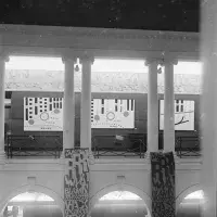 Peter Brüning’s Diversion paintings on north corridor, as seen across the Sculpture Court. Photo