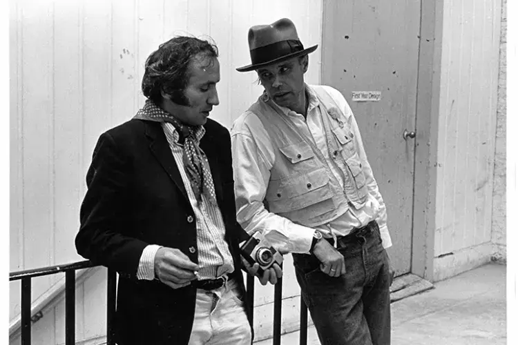 Richard Demarco and Joseph Beuys by the staircase of the Sculpture Department corridor, SGA at ECA (1970). Photo