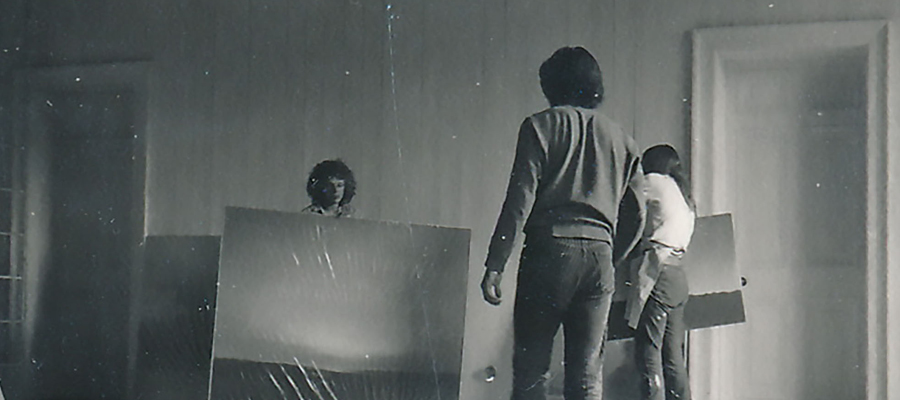 Paintings by Gerhard Richter being moved by student assistants in preparation for Strategy: Get Arts. Photo