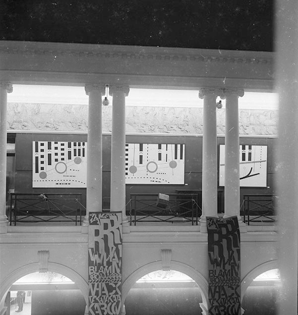 Peter Br&uuml;ning&rsquo;s Diversion paintings on north corridor, as seen across the Sculpture Court. Photo